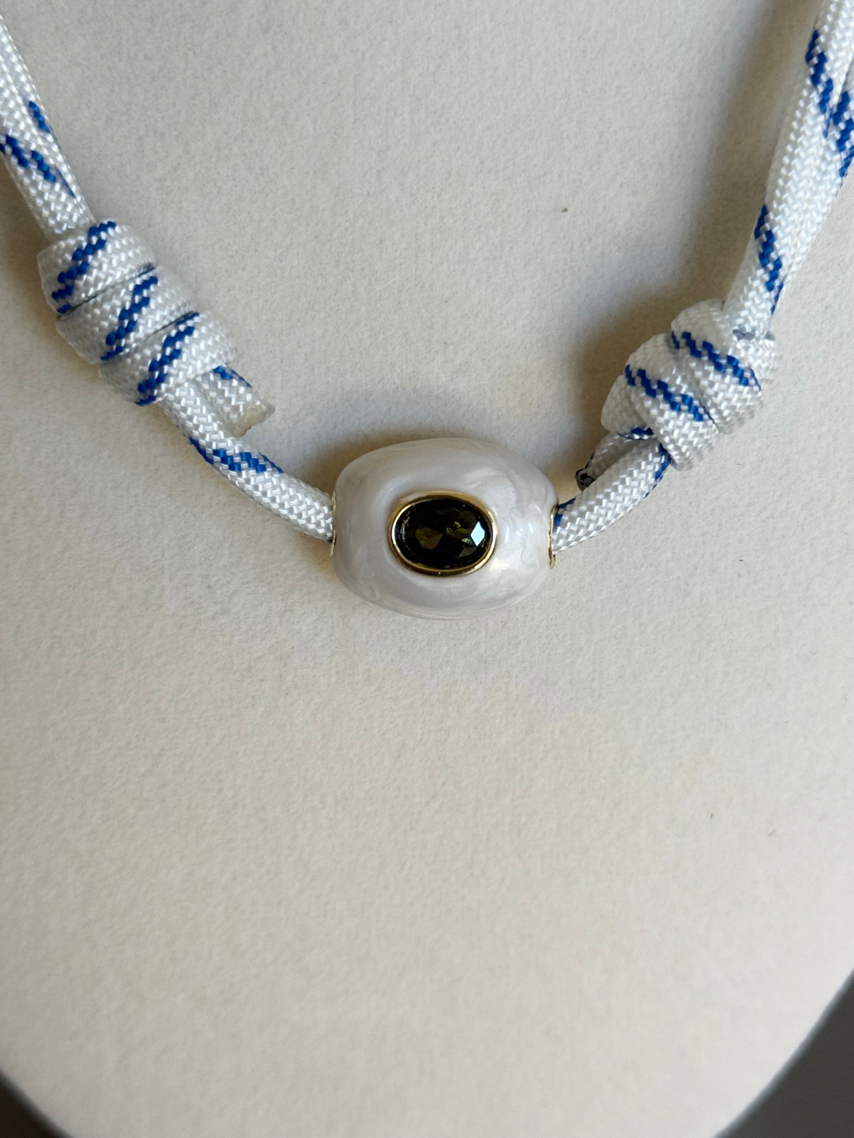 The Gemma - Blue Striped Cord + White/Peridot Enamel Stone